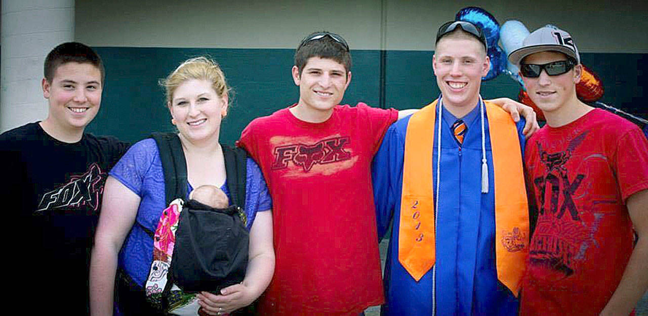 Nancy Babst’s five children, Alex, Kristen, James (J.T.), Joshua, and Garrett, at Joshua’s 2013 high school graduation. COURTESY PHOTO