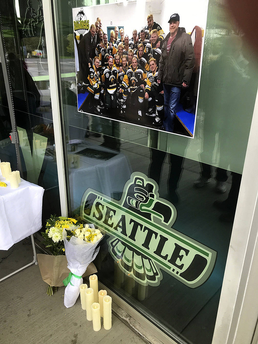 A photo of and a memorial for the Humboldt junior hockey league team are displayed outside the ShoWare Center. MARK KLAAS, Kent Reporter