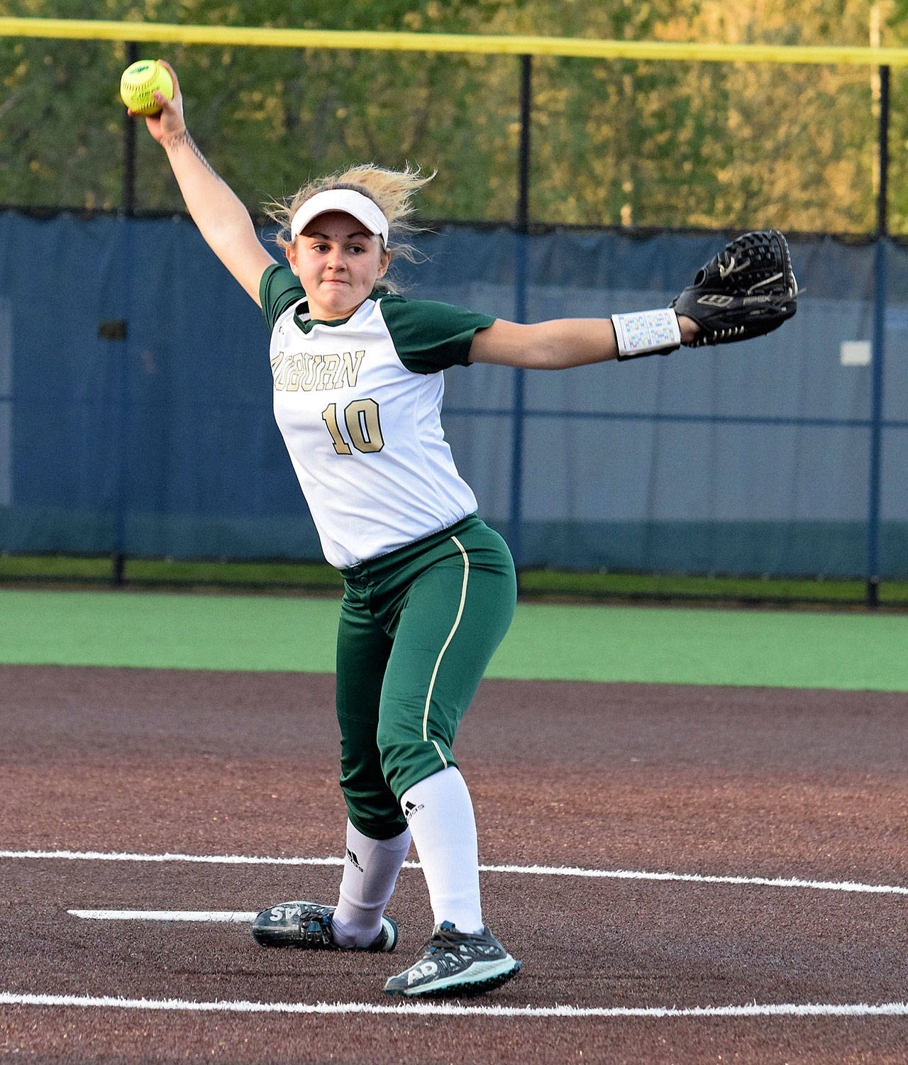 Auburn ace Kiana Adams prepares to deliver a pitch during the Trojans’ 7-2 win Tuesday night. Adams allowed two runs on seven hits. RACHEL CIAMPI, Auburn Reporter