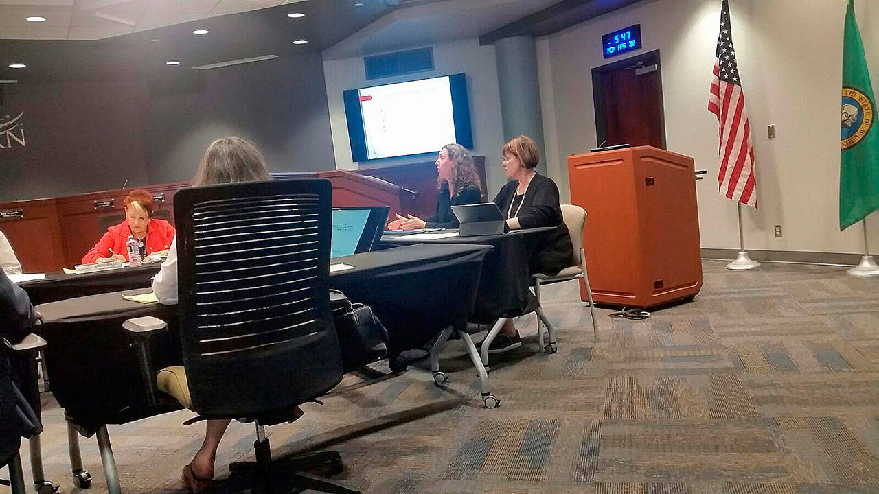 Joan Nelson, the City of Auburns solid waste supervisor, addresses the City Council on Monday night at City Hall. To her left is Finance Director Shelley Coleman. ROBERT WHALE, Auburn Reporter