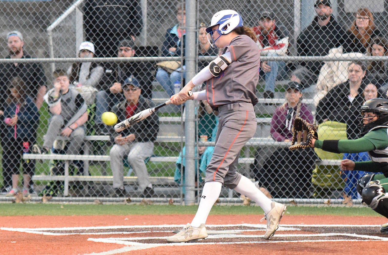 Auburn Mountainviews power-hitting Emily Bartholomew connects on a two-run triple in the sixth inning against Auburn in a North Puget Sound League Olympic Division softball game Thursday, May 3. RACHEL CIAMPI, Auburn Reporter