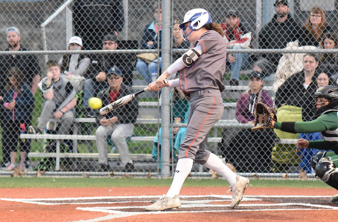 Auburn Mountainviews power-hitting Emily Bartholomew connects on a two-run triple in the sixth inning against Auburn in a North Puget Sound League Olympic Division softball game Thursday, May 3. RACHEL CIAMPI, Auburn Reporter