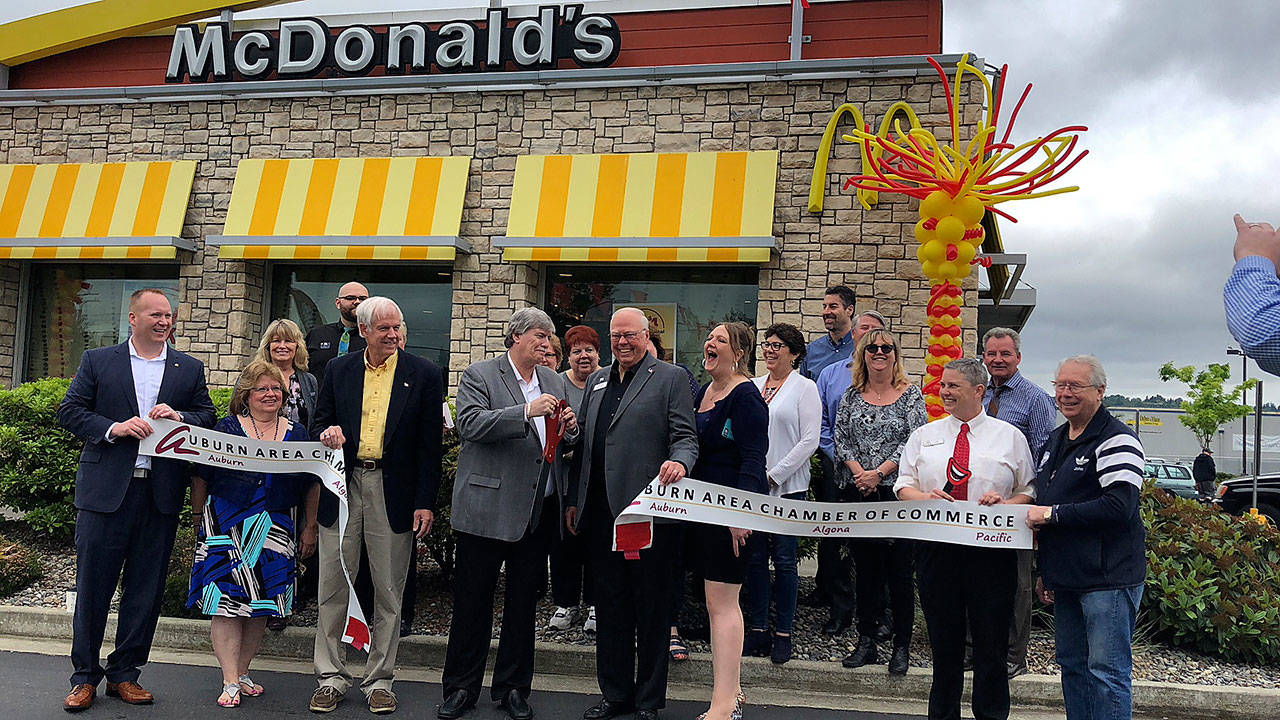 The new McDonald’s brings city and community leaders and supporters to a ribbon cutting and grand reopening Wednesday. COURTESY PHOTO