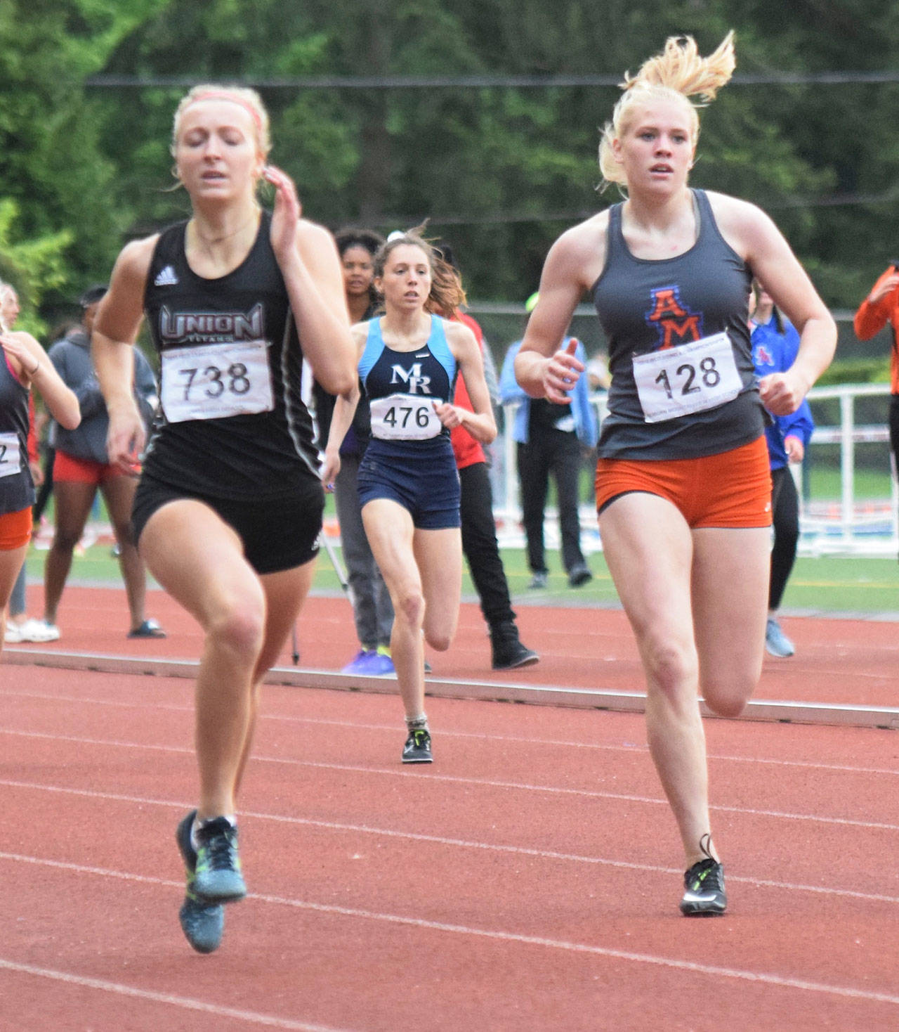 Auburn Mountainview’s Lily Lavine, right, takes sixth at 400 meters in a personal-best 59.03 seconds, qualifying for state. RACHEL CIAMPI, Auburn Reporter