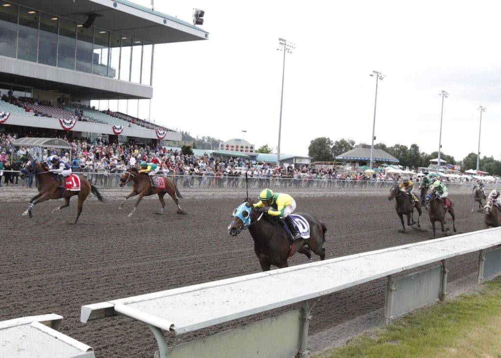 Invested Prospect (No. 10) holds off Mother of Dragons to capture the $50,000 Hastings Stakes for older fillies and mares at Emerald Downs on Monday. COURTESY TRACK PHOTO