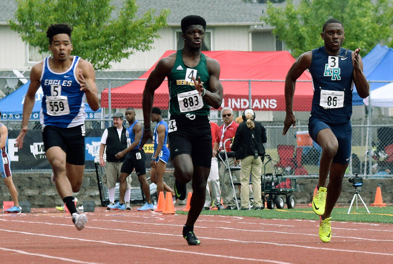 Auburn Riverside’s Jaden Robinson, far right, battles Kentridge’s Solomon Hines and Federal Way’s Anthony Frazier, far left, in the 100-meter dash at the 4A track and field championship last weekend. Robinson finished third in the 100 at 10.98 seconds, adding a second in the 200 (21.89) and a third in the 400 (49.66). RACHEL CIAMPI, Auburn Reporter