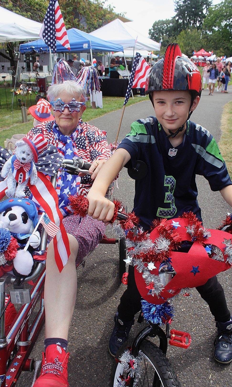 Carol O’Neal and her grandson, Jak, came dressed and ready for the festivities at last year’s Fourth of July celebration. All the fun and games return to Les Gove Park on Wednesday, the Fourth. MARK KLAAS, Auburn Reporter