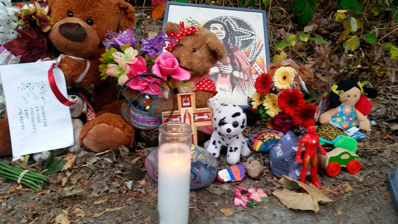 A memorial emerges near the crash site that took the lives of a man and three children in Auburn on June 28. ROBERT WHALE, Auburn Reporter