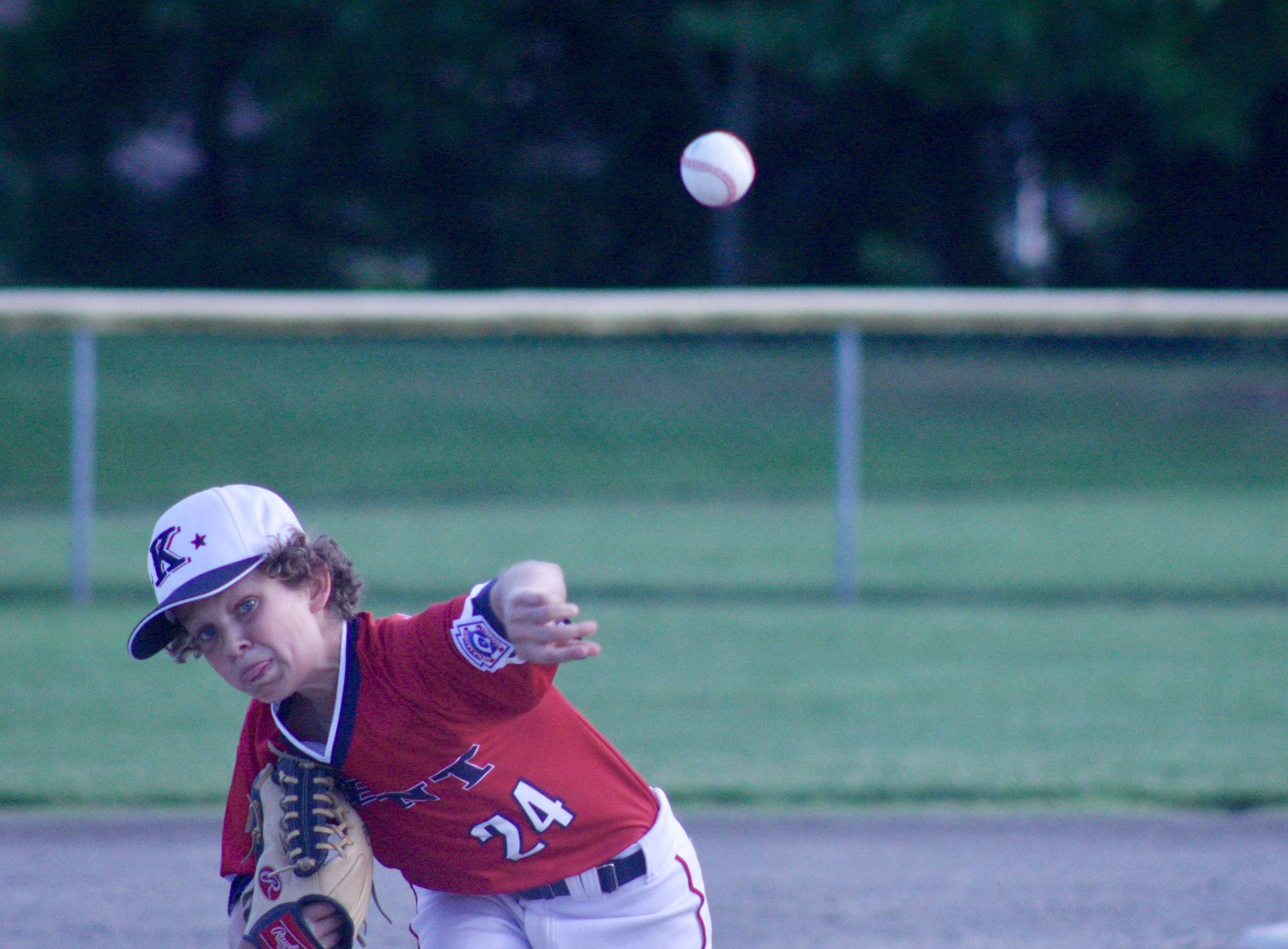 The Kent All-Stars’ Ethan Loghry delivers a pitch during his stout performance against FME/Steel Lake on Thursday. Loghry pitched into the sixth inning before reaching his 85-pitch limit. MARK KLAAS, Kent Reporter