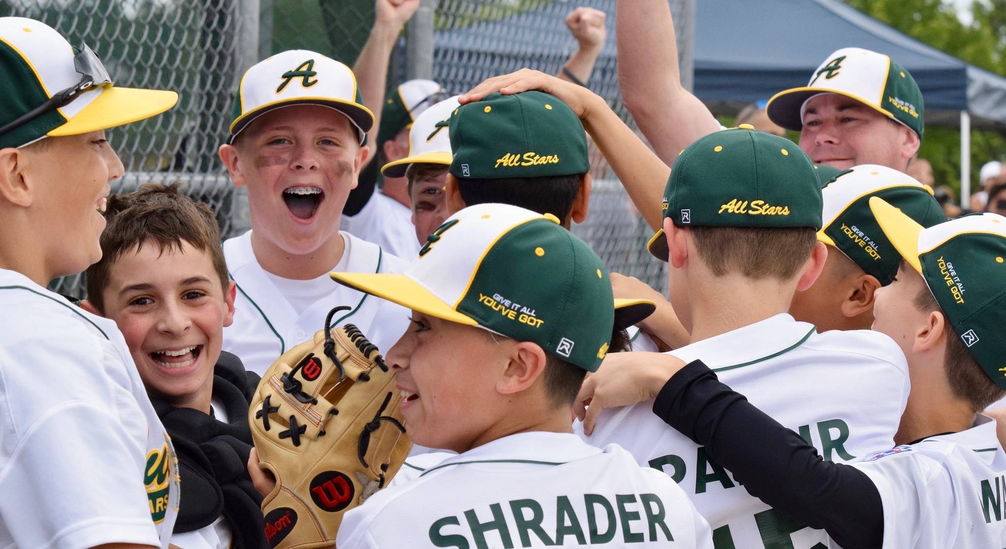 The Auburn All-Stars celebrate after defeating Kent 2-1 to take the District 10 Majors Little League title on Saturday at Sunset Park. RACHEL CIAMPI, Auburn Reporter
