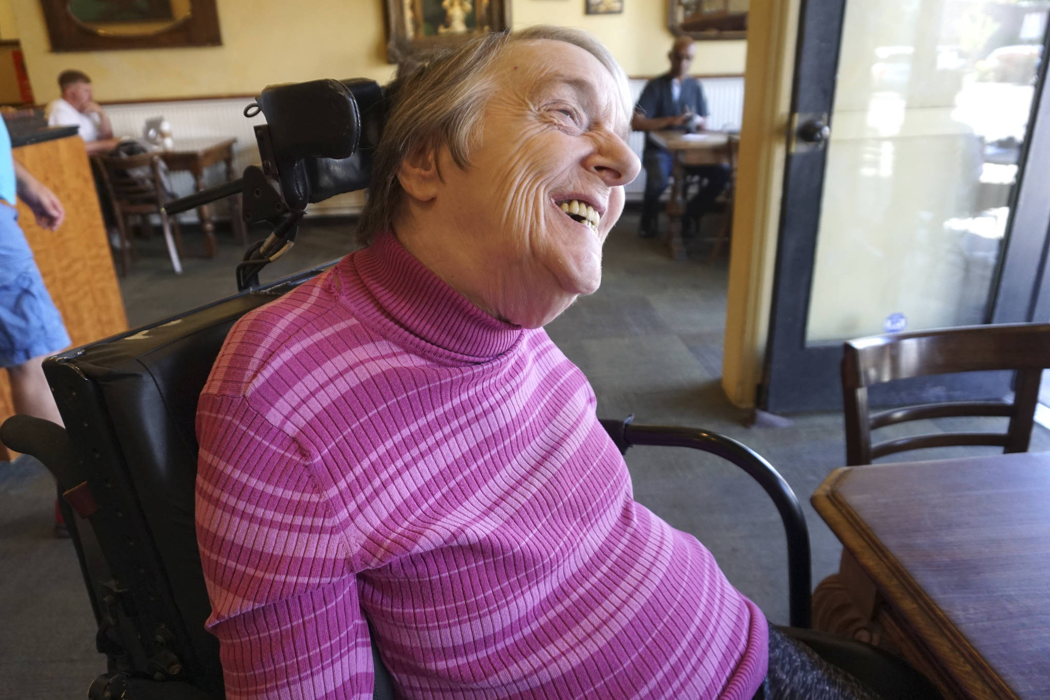 Dianne Laurine, a Commissioner for the Seattle Commission for People with Disabilities says that she needs plastic straws to drink liquids, and that she easily bites through ones made out of paper. Photo by Melissa Hellmann