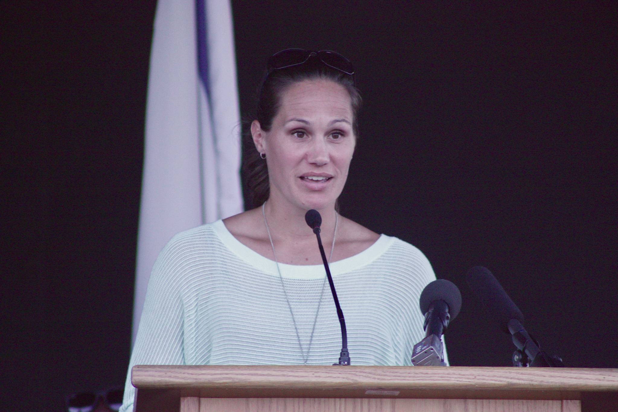 Shelly Moreno talks about her husband, Kent Police Officer Diego Moreno, at a community vigil in Town Square Plaza on Wednesday night. Diego Moreno was killed in the line of duty Sunday. MARK KLAAS, Kent Reporter