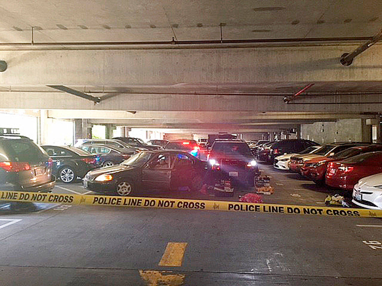 The scene in the Kent Station garage where a deputy fatally shot a man who was the driver in a stolen vehicle. COURTESY PHOTO, King County Sheriff’s Office