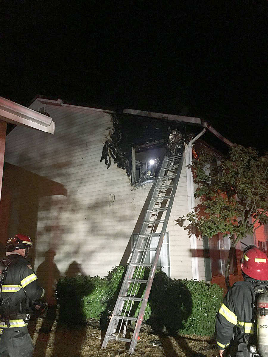 Firefighters confined the extinguished fire at the Clearwater Ridge Apartments to one unit early Wednesday. COURTESY PHOTO, VRFA
