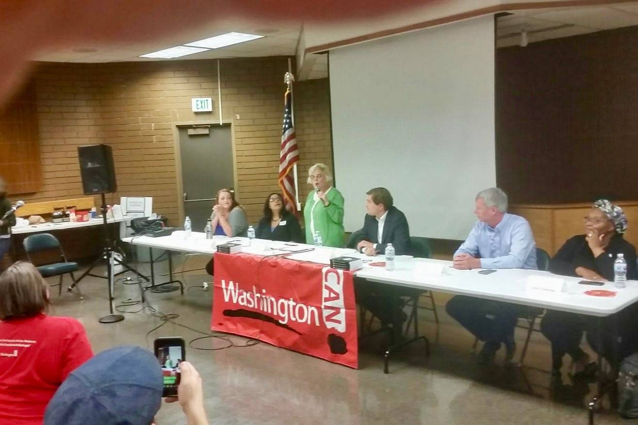 Six Democrats running for state office, including 30th Legislative District Senatorial candidate, Claire Wilson, standing, take turns at the mic at a forum in Auburn on Sept. 26. The Democrats who showed up for last week’s forum at the Aerospace Mechanics union hall were, from left: Victoria Mena; Mona Das; Wilson; Mike Pellicciotti; Pat Sullivan; and Debra Entenman. ROBERT WHALE, Auburn Reporter