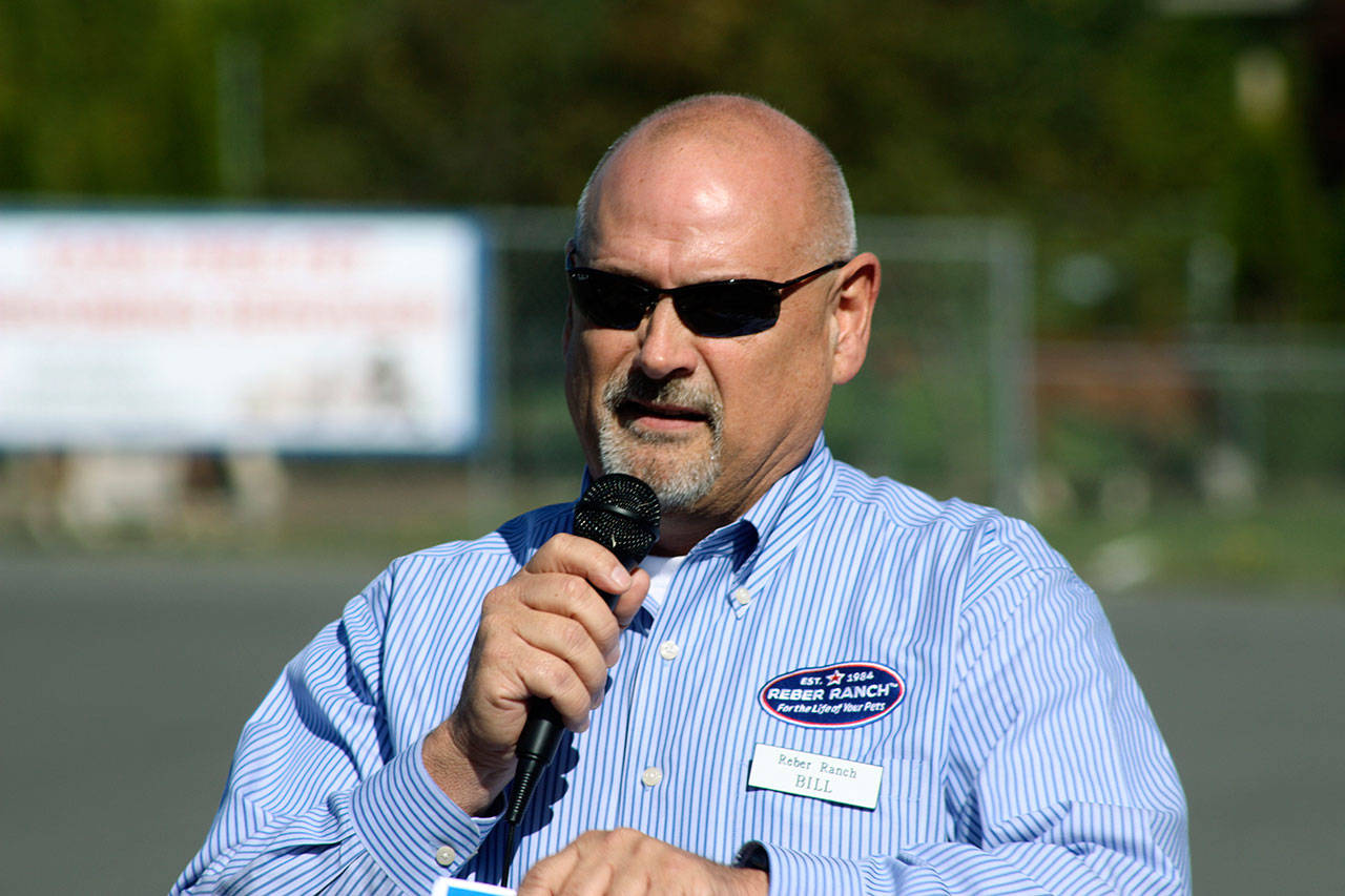 Bill Greene, general manager of Reber Ranch, talks to a crowd at an award-recognition ceremony outside the store on Sept. 26. Reber Ranch recently was chosen King County Rural Small Business of the Year. MARK KLAAS, Kent Reporter