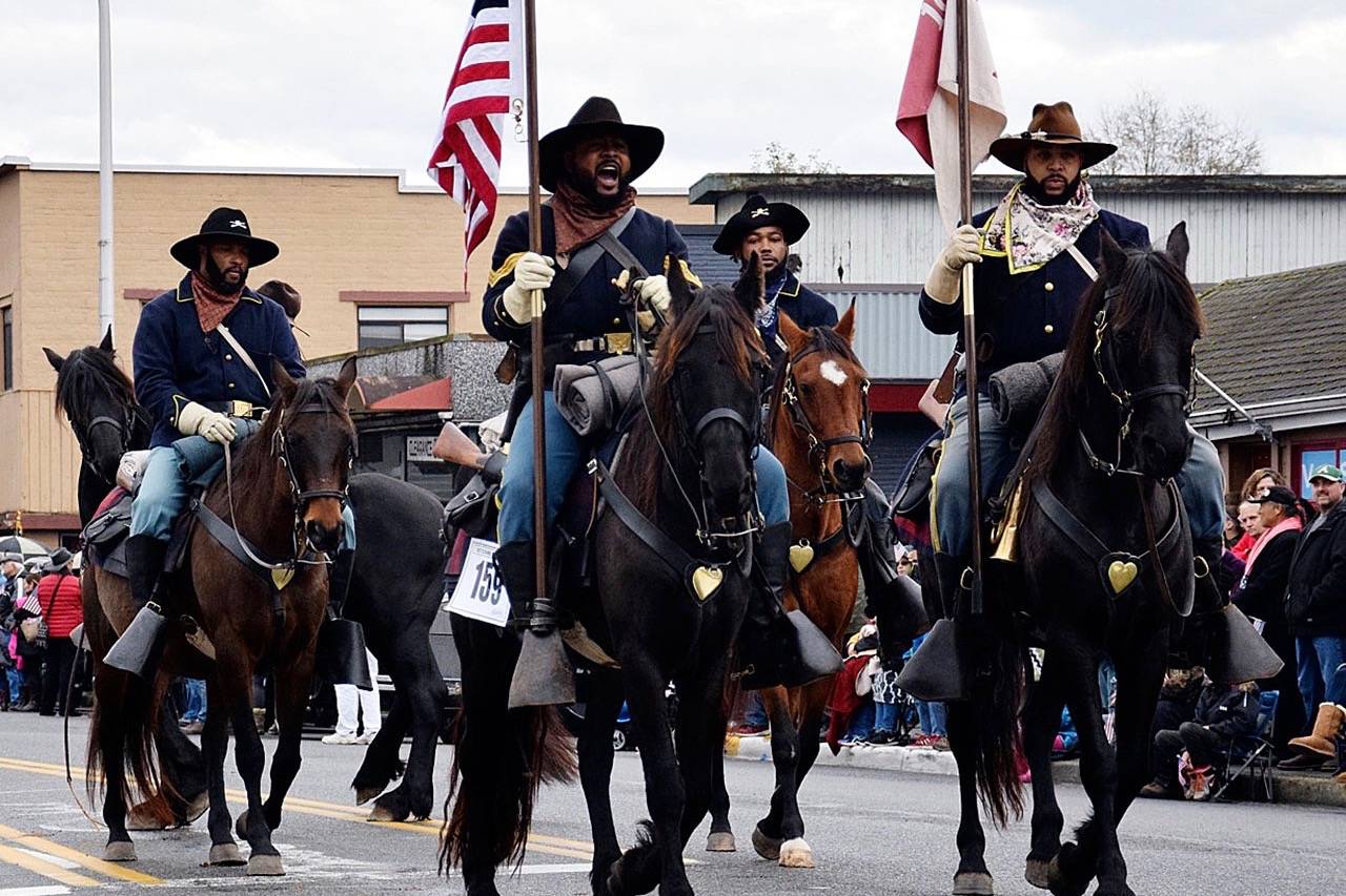 The Buffalo Soldiers of Seattle received the Veteran’s Award for Best Non-Motorized Entry at last year’s Auburn Veterans Parade. The 53rd annual parade returns to Main Street on Saturday, Nov. 10, and will feature more than 200 entries and nearly 6,000 participants. RACHEL CIAMPI, Auburn Reporter