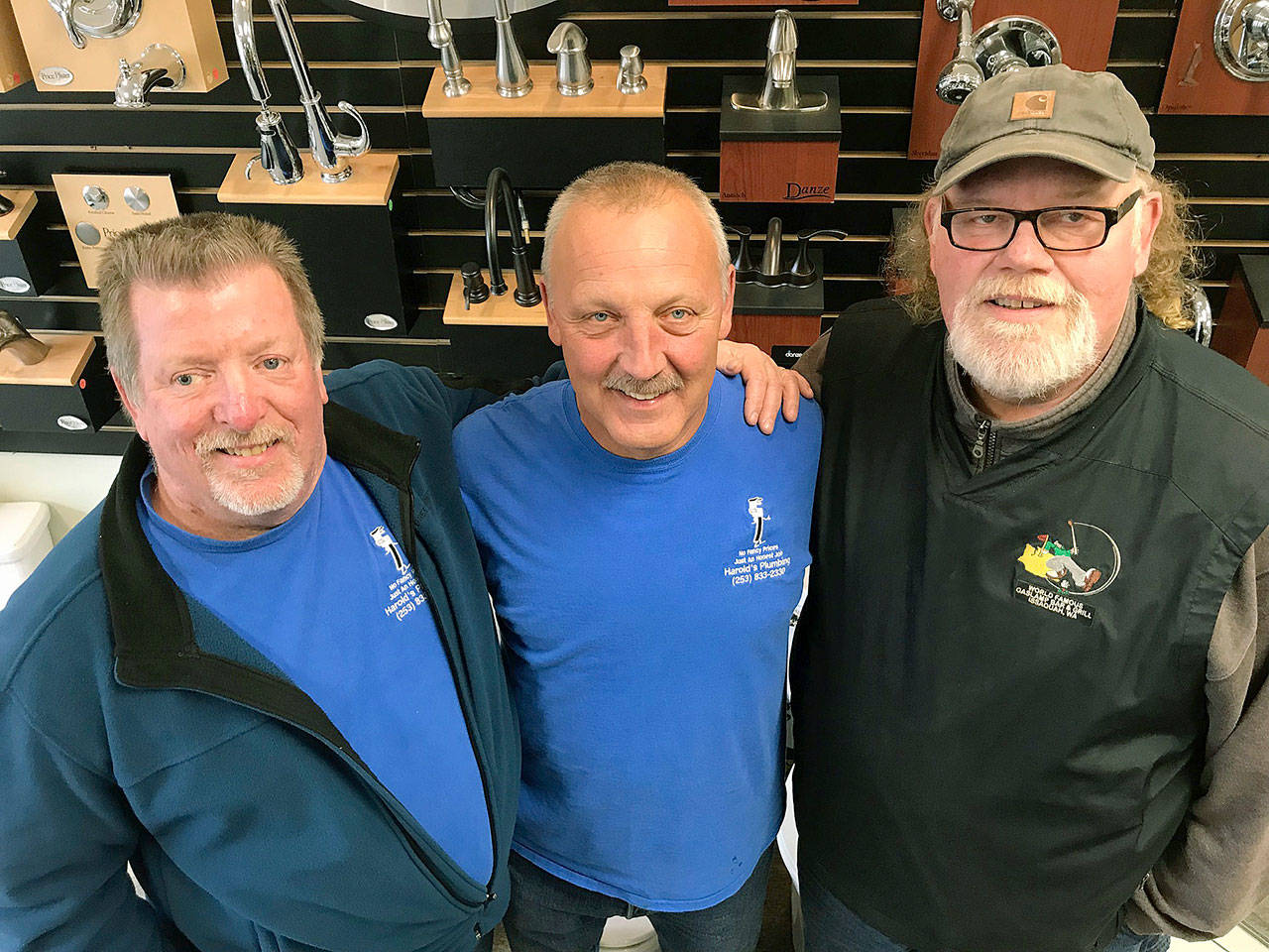 Three Musketeers: Curt Gilbert, middle, and his sidekicks, Dean Fitzsimmons, left, and Scott Armstrong have enjoyed a long, working friendship at Harold’s Plumbing, their comfortable “clubhouse.” MARK KLAAS, Auburn Reporter