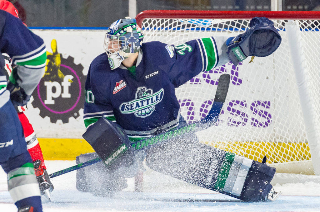 Thunderbirds goalie Liam Hughes anticipates a shot during WHL play against Portland on Saturday night. COURTESY PHOTO, Brian Liesse, T-Birds