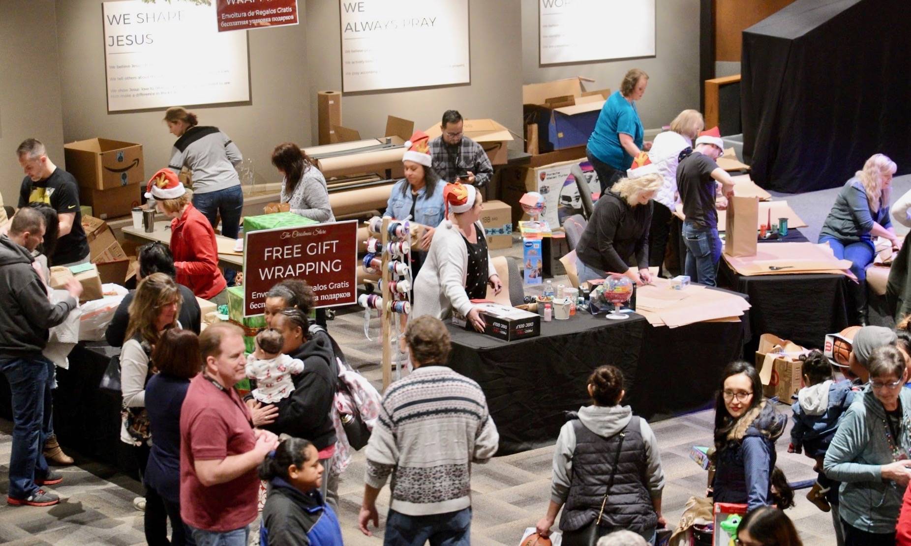 Families shop for gifts during The Christmas Store event at Northwest Family Church hosted last Saturday. COURTESY PHOTO