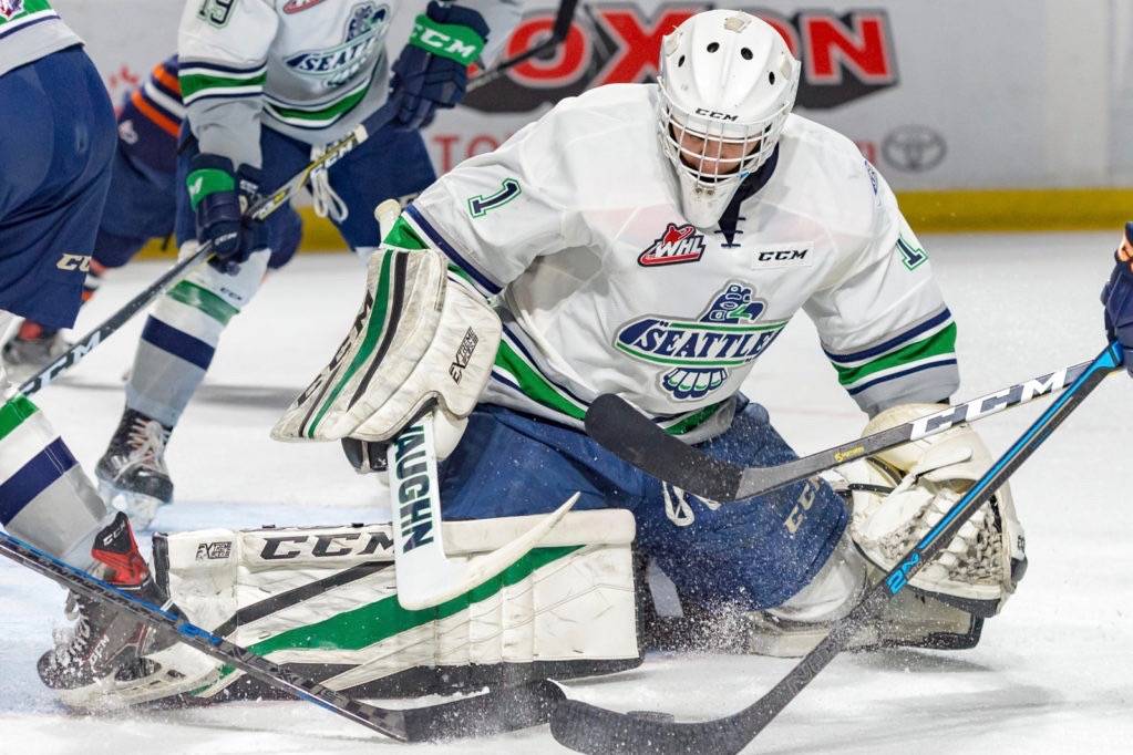 Seattle goalie Roddy Ross looks to smother the puck during WHL play against Kamloops on Sunday. Ross made 24 saves and improved his record to 5-1-0-1. COURTESY PHOTO, Brian Liesse, T-Birds