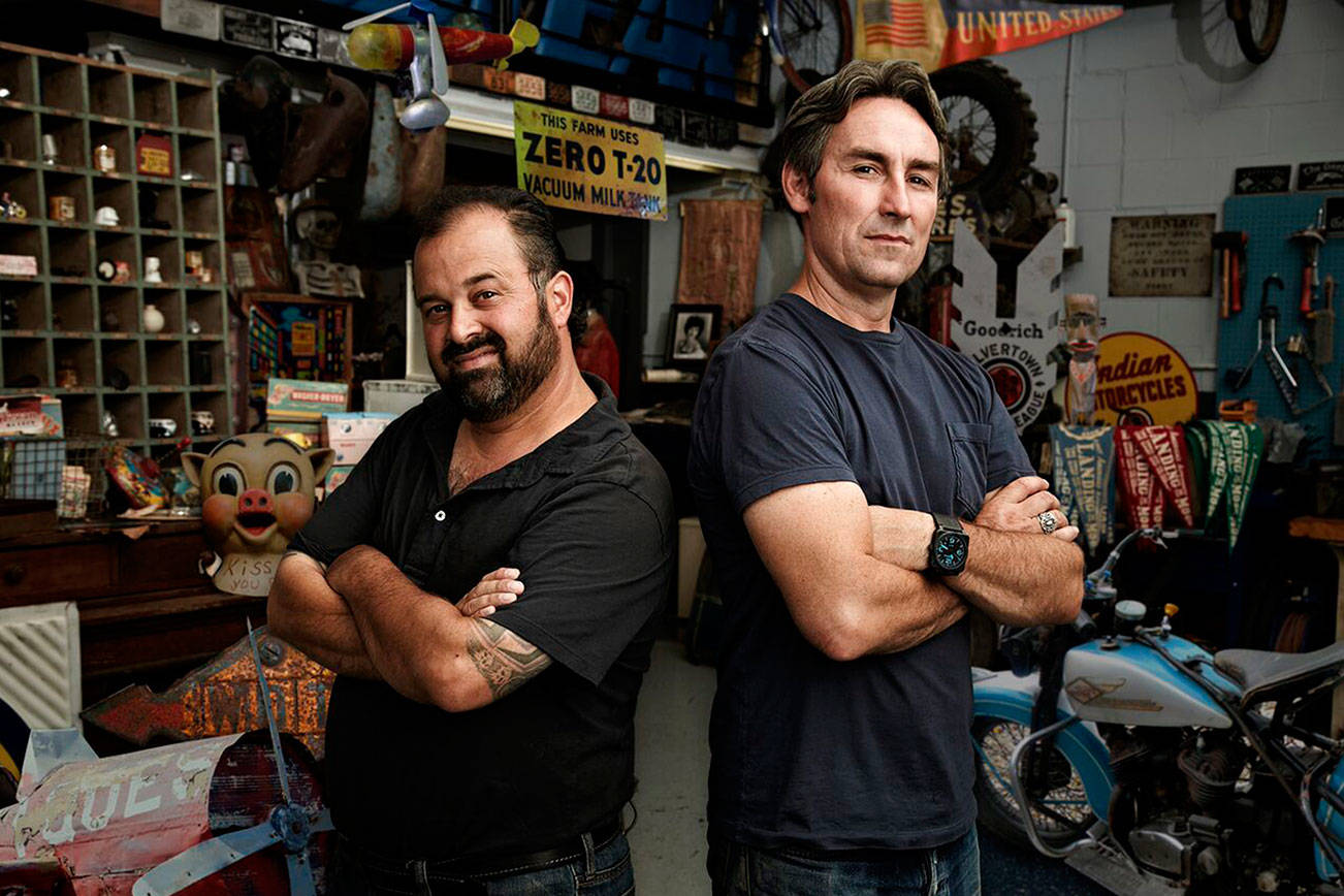 Mike Wolfe, left, and Frank Fritz star in the show, ‘American Pickers.’ COURTESY PHOTO