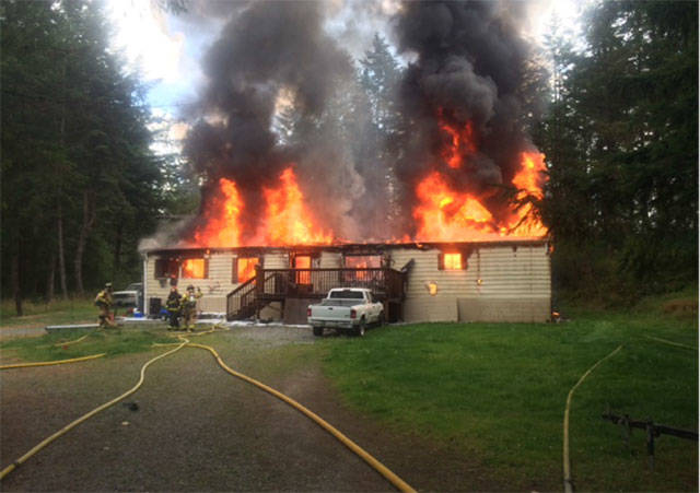 The July 6, 2016 fire that destroyed a double-wide mobile home at 29659 142nd Ave. SE in Auburn also claimed the life of an Auburn mam. VRFA file photo
