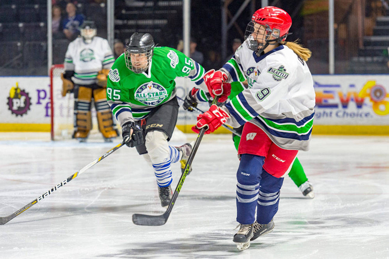 Sponsored teams take to the ice at the accesso ShoWare Center during the 21st annual Hockey Challenge, a Feb. 23 charity event that raised money for Ronald McDonald House Charities. COURTESY PHOTO, Brian Liesse, T-Birds