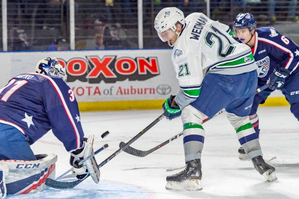 The Thunderbirds’ Matthew Wedman tries to drill the puck past Americans goalie Talyn Boyko during Western Hockey League play at the accesso ShoWare Center on Sunday night. Wedman scored two goals and had an assist in the T-Birds’ 6-3 win. COURTESY PHOTO, Brian Liesse, T-Birds