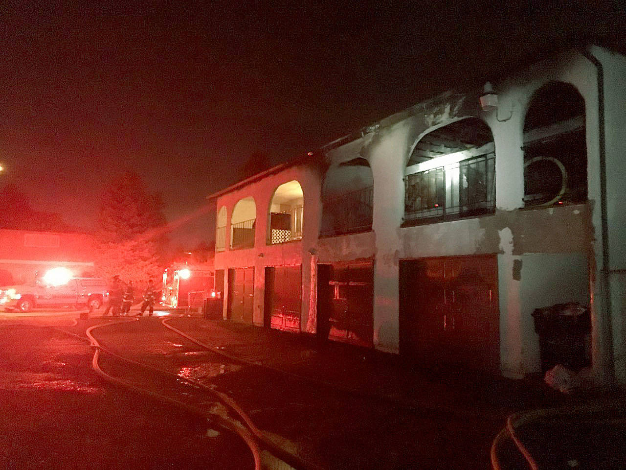 VRFA firefighters work to extinguish a four-plex fire early Wednesday morning that displaced 14 people. COURTESY PHOTO, VRFA