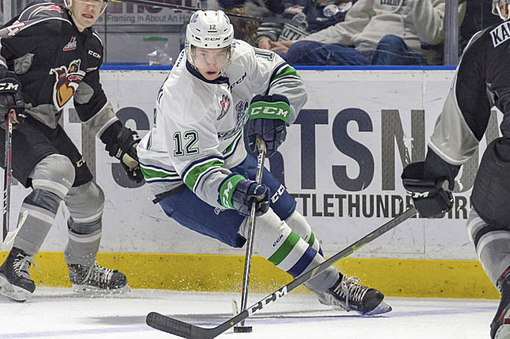 The Thunderbirds’ Henrik Rybinski skates through the Giants during WHL play Tuesday night. COURTESY PHOTO, Brian Liesse, T-Birds