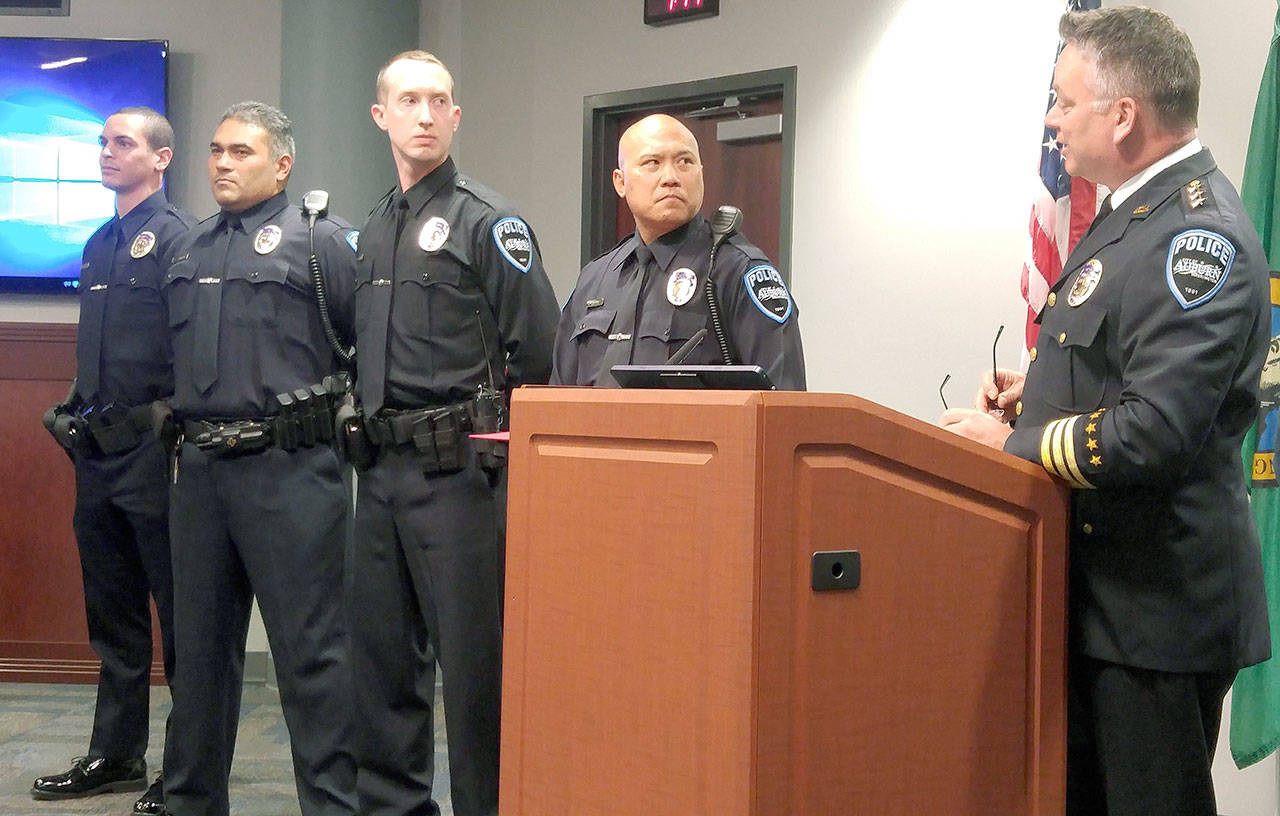 Auburn Police Officers, left to right, Micheal Bateman, Stanley Sedillo, Matt Wilkinson and Ben Kapule received commendations from Chief William Pierson on Monday night at City Hall for helping to save a man’s life on Jan. 21.