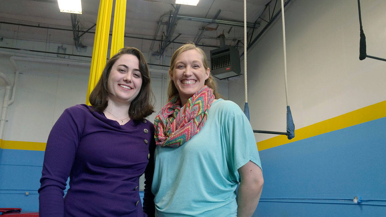 Instructor Zora Blade, left, helps Crystal Campbell run the show at Synapse Circus Center, a recreational circus school devoted to developing the ability of its students to express themselves through circus arts, regardless of age, size or gender. ROBERT WHALE, Auburn Reporter