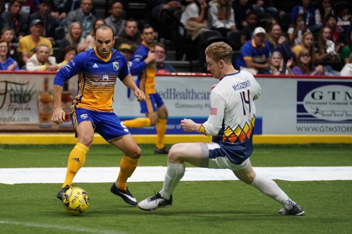 The Sockers’ Landon Donovan, left, and the Stars’ Vince McCluskey vie for the ball during Game 2 Saturday night at San Diego. COURTESY, Stars