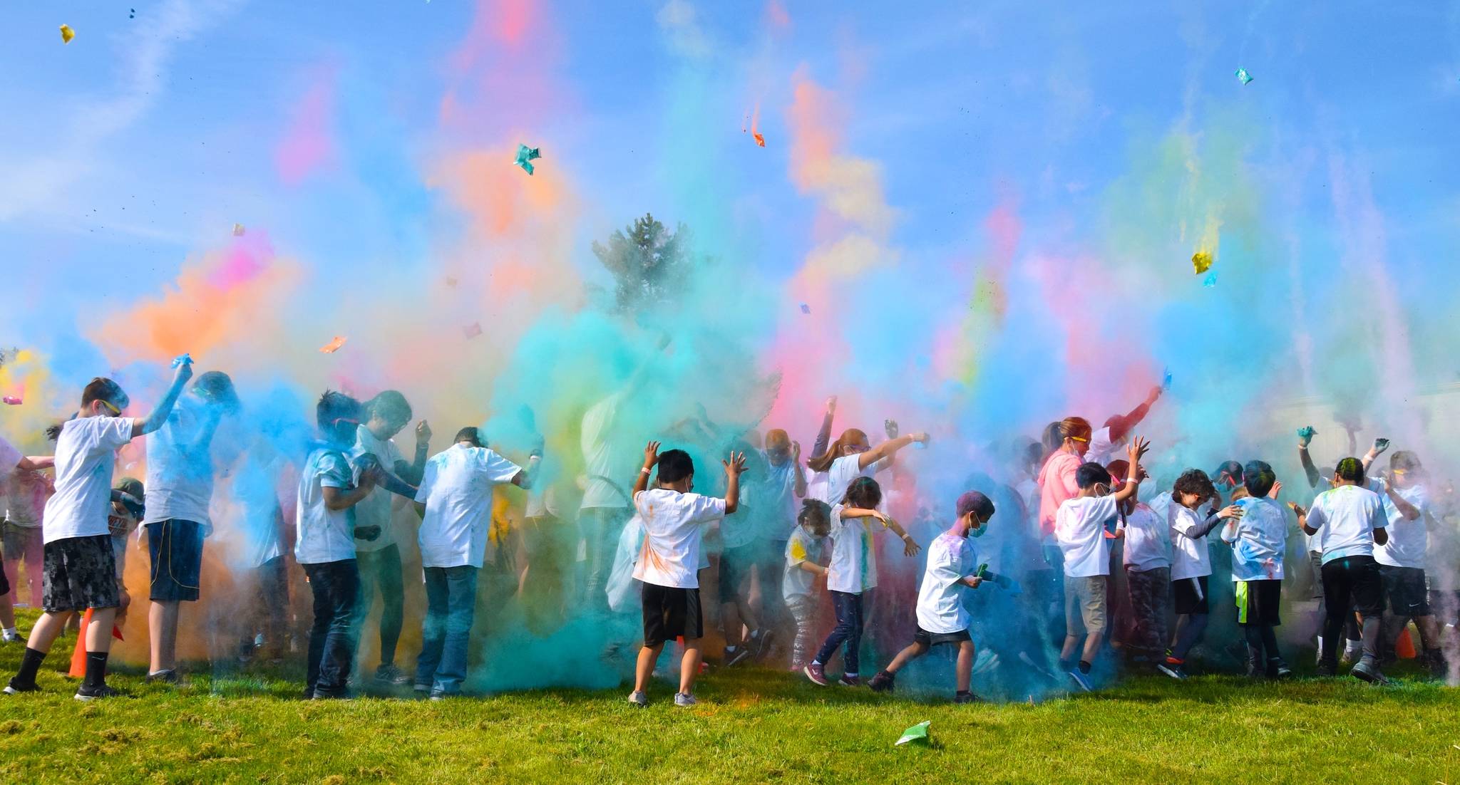 Participants in the 2.5-mile run powder each other with playful hues at a color-throwing station at the Buena Vista Seventh-day Adventist School in Auburn on Sunday. RACHEL CIAMPI, Auburn Reporter
