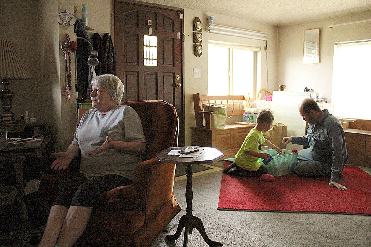 Cindy Lu, left, chats with visitors while Pat brings out the toys to keep the littlest visitors occupied. Olivia Sullivan/staff photo