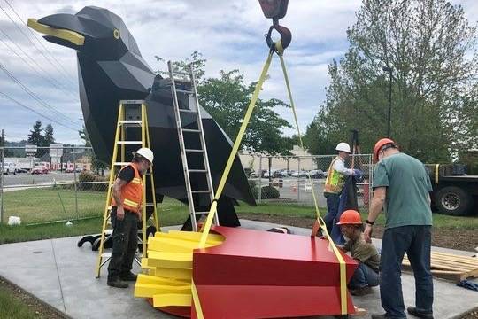 In preparation for the Landing Celebration on May 31, artist Peter Reiquam installed Crow With Fries at Les Gove Park on Wednesday, May 15. The grass area around the landing pad will be restored. COURTESY PHOTO, city of Auburn