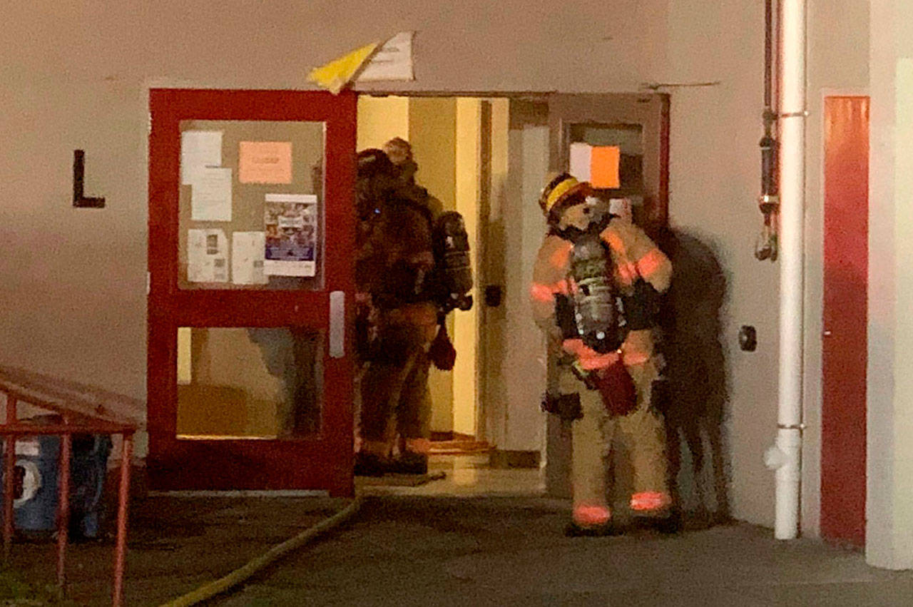 South King Fire and Rescue firefighters respond to a fire in the gym at Thomas Jefferson High School on July 4. COURTESY PHOTO, SKFR