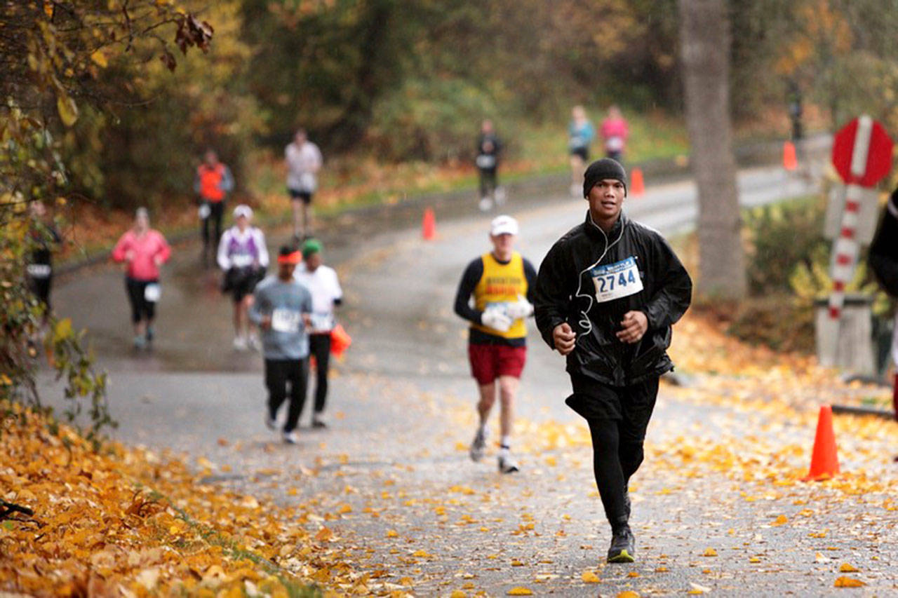 Peter Phan, then a 26-year-old Algona man and a kidney dialysis patient for nearly 10 years, competes in the Seattle Marathon on Nov. 27, 2011. He completed his first marathon in 5 hours, 41 minutes and 25 seconds, 1,247th overall in a field of 11,007 competitors. REPORTER FILE PHOTO, courtesy of CBBell.com