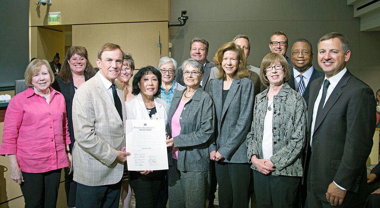 From left: King County Councilmembers Jeanne Kohl-Welles, Claudia Balducci, Pete von Reichbauer and Kathy Lamber; Eileen Yamada Lamphere; Julie Acosta; Carol Grimes; King County Councilmember Reagan Dunn; Karen Meador; King County Councilmember Dave Upthegrove; Linda van Nest; and King County Councilmembers Joe McDermott, Larry Gossett and Rod Dembowski. COURTESY PHOTO