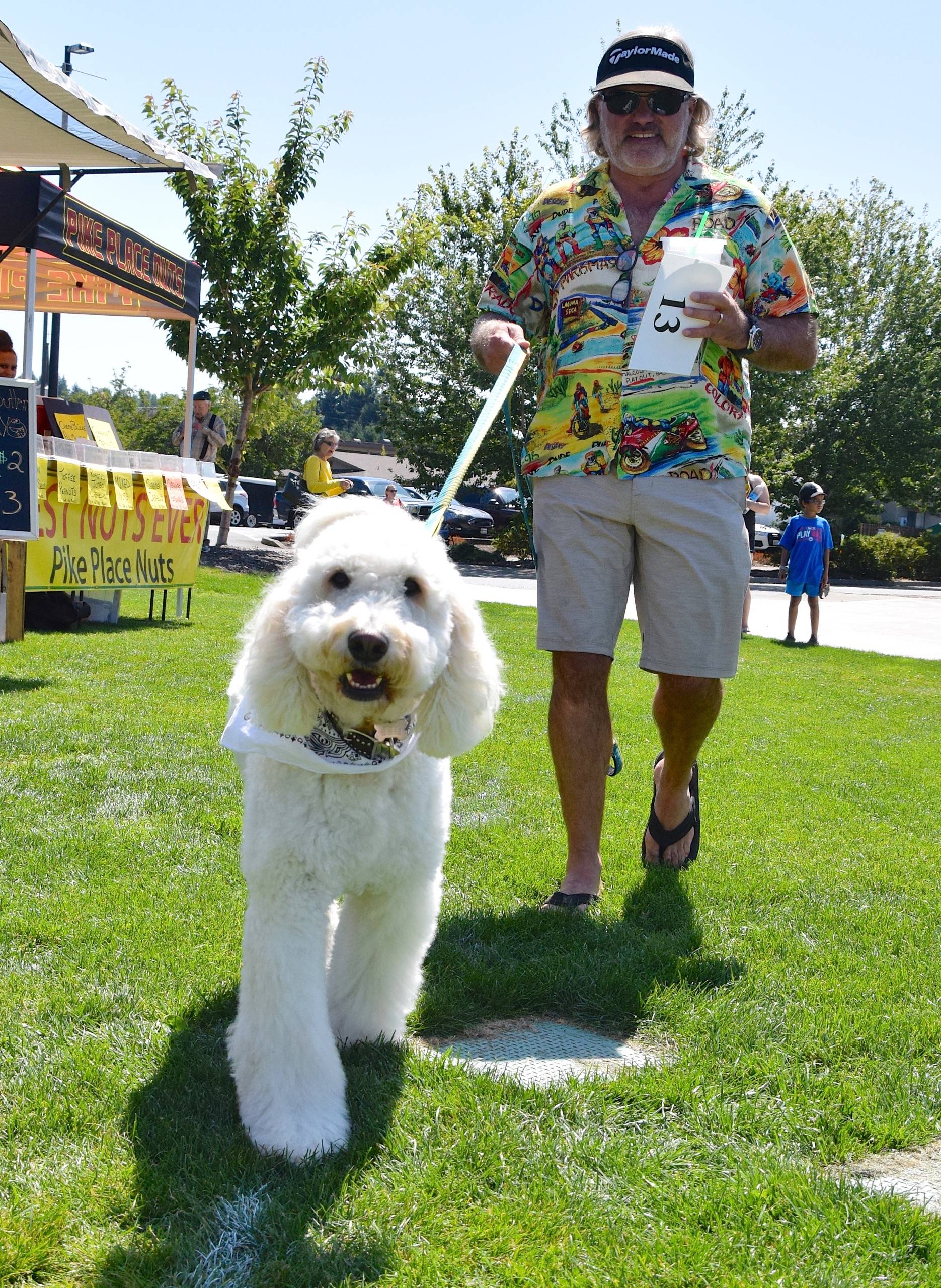 Lonnie Alexander walks his dog, Blue, in the dog show. RACHEL CIAMPI, Auburn Reporter