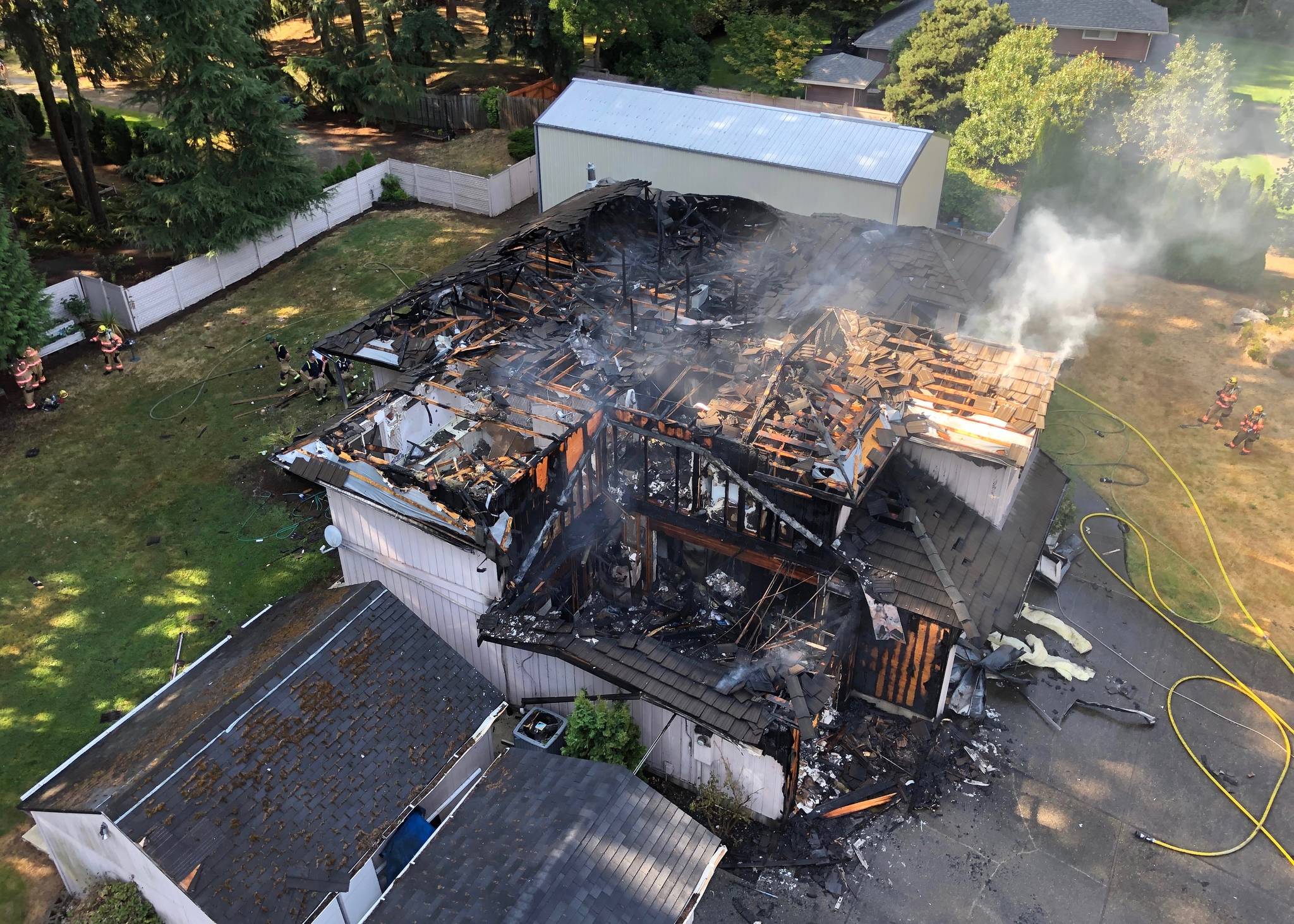 Firefighters doused an Auburn house fire that was heavily damaged Thursday. COURTESY PHOTO, South King Fire and Rescue