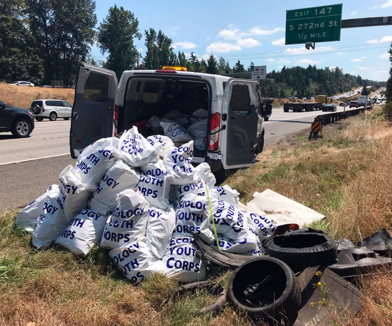 The Department of Ecology Youth Corps clean up trash littered along major Washington highways and freeways during a summer job opportunity program. COURTESY PHOTO, Steven Williams
