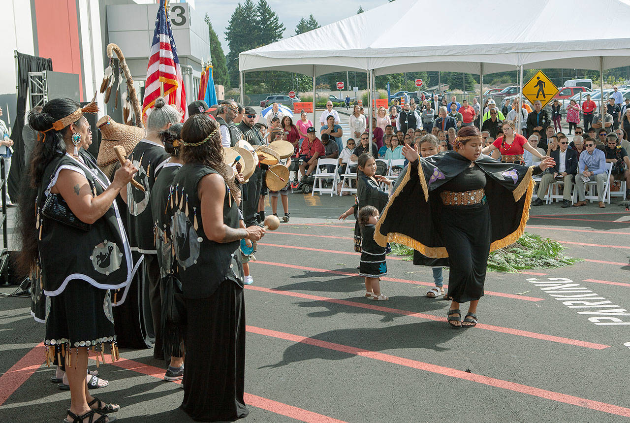 The Muckleshoot Tribe sing and dance as they welcome the public to the official groundbreaking of its luxury hotel tower Sept. 5. ROBERT WHALE, Auburn Reporter