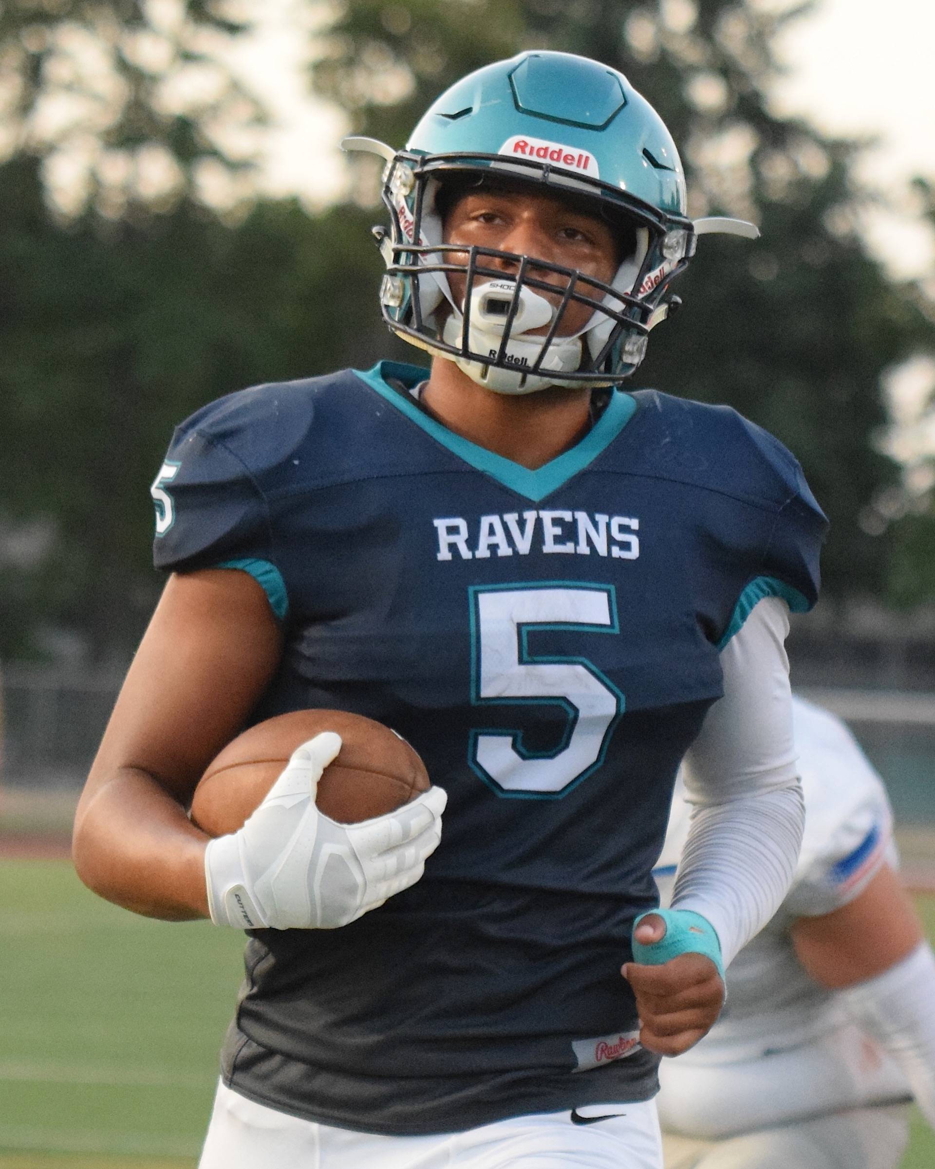 Auburn Riverside’s Javon Forward finds the end zone for one of his two touchdown runs in the first quarter against Auburn Mountainview on Friday night. RACHEL CIAMPI, Auburn Reporter