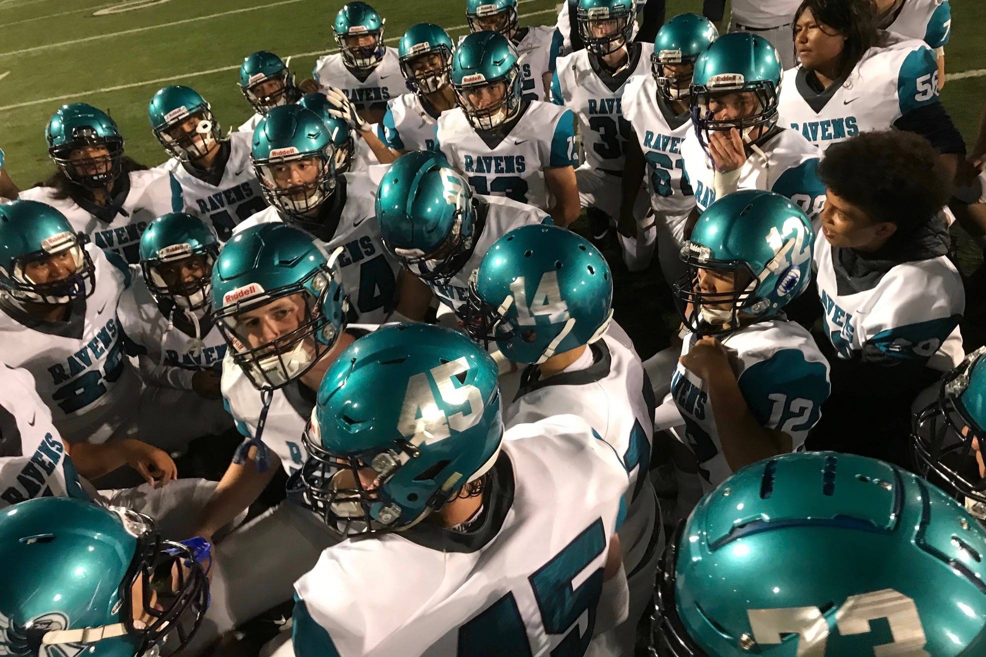 Auburn Riverside gathers after beating Auburn on Friday night to retain the Fugate Trophy for the third straight season. MARK KLAAS, Auburn Reporter