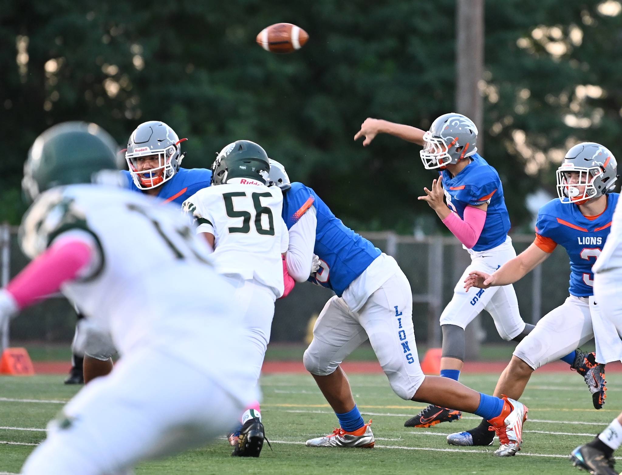 Auburn Mountainview quarterback Kayde Bodine delivers a quick toss to a receiver during the first half of their North Puget Sound League game against Auburn on Friday night. Bodine threw five touchdowns in the Lions’ win. RACHEL CIAMPI, Auburn Reporter