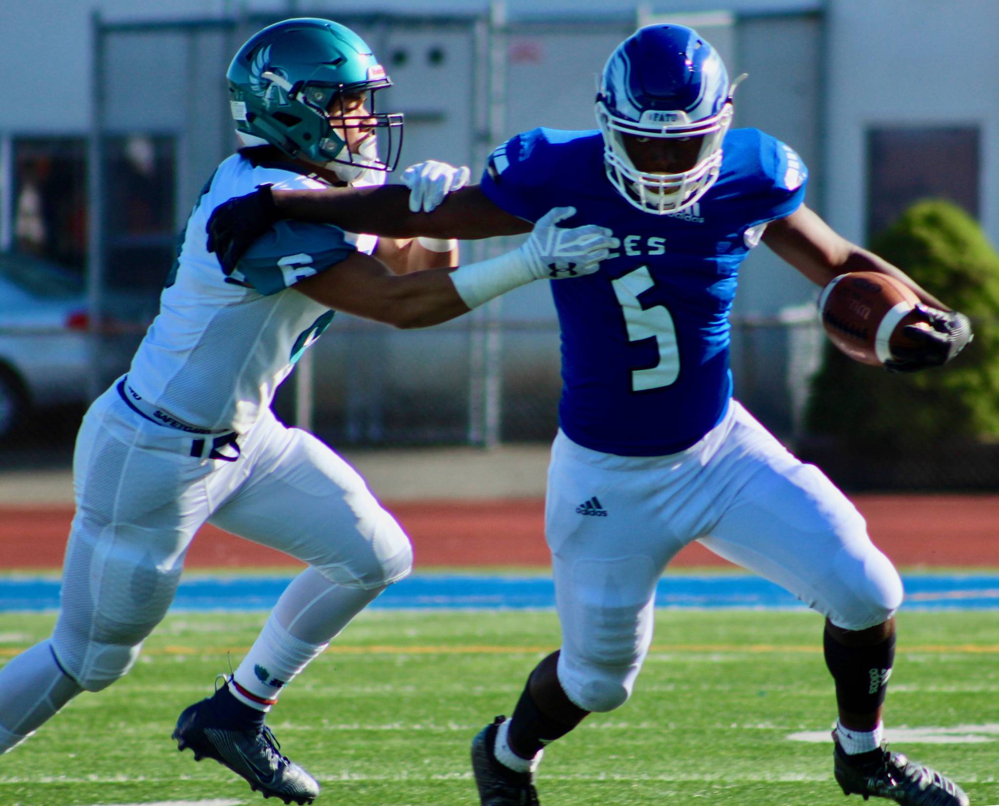 Auburn Riverside’s Arthur Tauiliili pursues Federal Way running back Jaylen Bogan during first-half play Friday. OLIVIA SULLIVAN, Federal Way Mirror