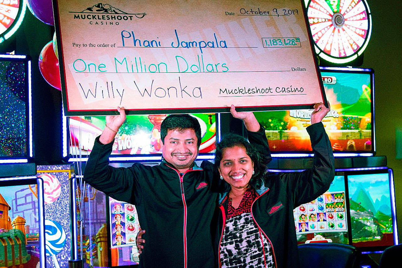 Phani Jampala and his wife celebrate after the Renton man won more than a million dollars playing on the Muckleshoot Casino’s newly installed Willy Wonka World of Wonka machines. COURTESY PHOTO, Muckleshoot Casino