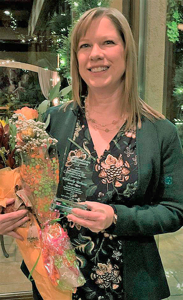 VRFA’s Kimberly Terhune receives the Fire Educator of the Year award. COURTESY PHOTO
